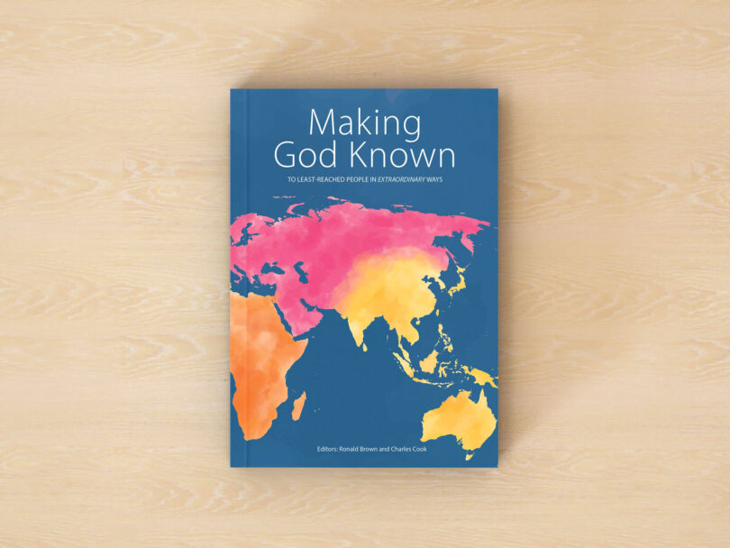 The book "Making God Known" on a table.